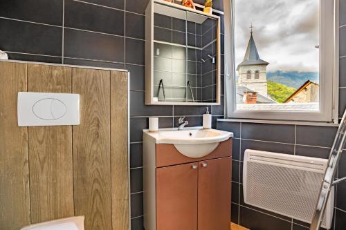 Ένα μπάνιο στο Appartement cocooning avec vue sur les Pyrénées