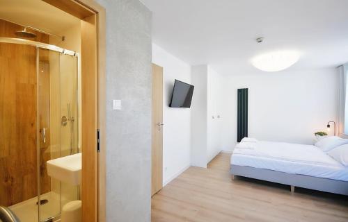 Llit o llits en una habitació de Hotel Baltic Sun