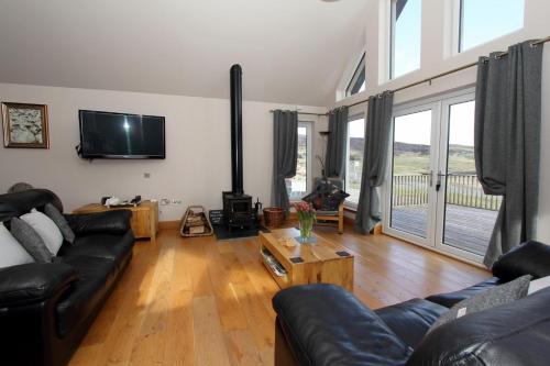 TV a/nebo společenská místnost v ubytování Ceann an Loch Cottage