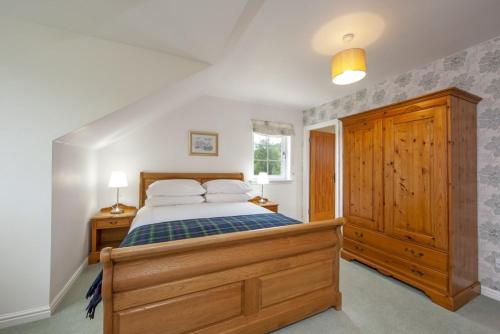 Llit o llits en una habitació de Branter Lodge