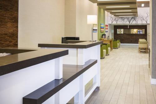 a lobby of a hospital with a reception counter at Holiday Inn Salem by IHG in Salem