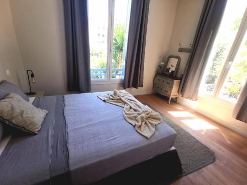 Posteľ alebo postele v izbe v ubytovaní Appartement, 3 pièces, Villa Monte Europa