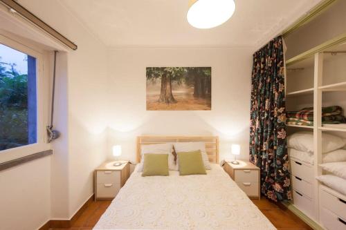 מיטה או מיטות בחדר ב-Sintra Farm Villa Guest House