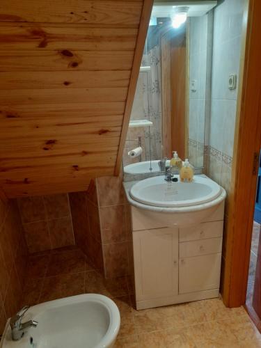 Ванная комната в Casa das Neves