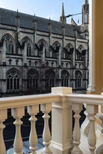 a view from a balcony of a large building at Star Struck on Stuart in Dunedin