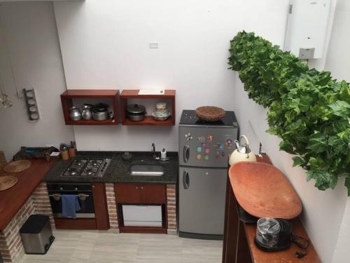 A cozinha ou kitchenette de Apto duplex tipo loft hermoso y perfecto para hospedarme