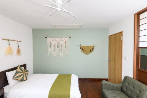 מיטה או מיטות בחדר ב-翡翠-Jade-