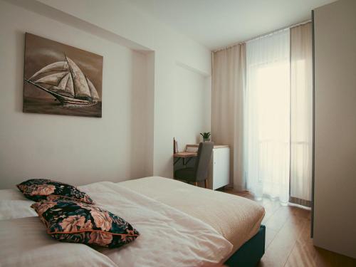 Postel nebo postele na pokoji v ubytování Apartamenty Vulcan