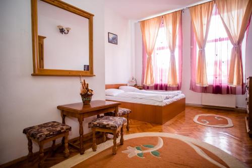 Postel nebo postele na pokoji v ubytování HOTEL MARION