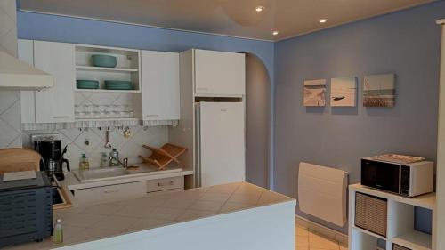 Katil atau katil-katil dalam bilik di Superbe appartement, proche plage des Sablettes