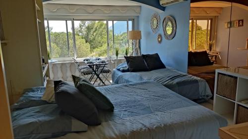 Katil atau katil-katil dalam bilik di Superbe appartement, proche plage des Sablettes