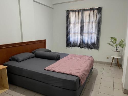 Postel nebo postele na pokoji v ubytování Villa Lippo carita langsung pantai 3bedroom