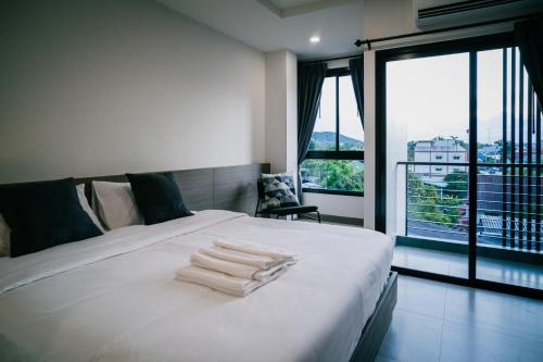 Llit o llits en una habitació de N24 Chonburi