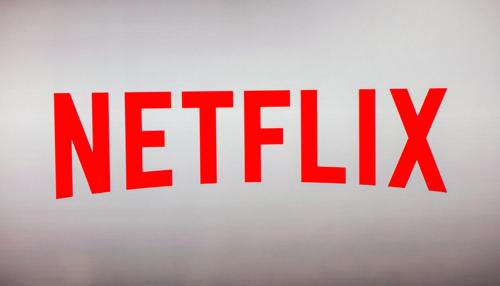 a red netflix sign on the side of a wall at Escape Apartments, Balcony, Pool, Gym & Spa in La Julia in Santo Domingo
