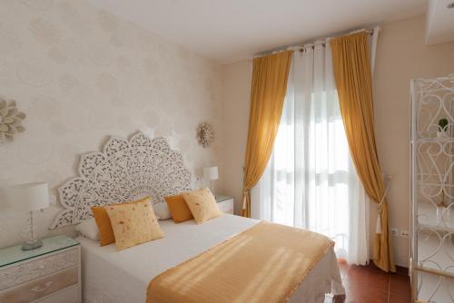 מיטה או מיטות בחדר ב-Costa Ballena Unifamiliar