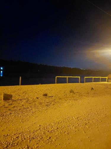 a field of sand with a goal in the distance at Vila Ljubomir - Srebrno Jezero in Kisiljevo