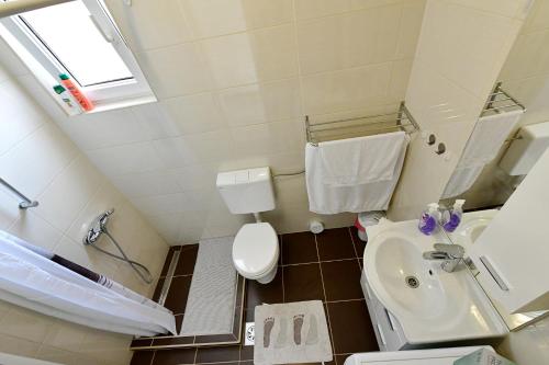 Kúpeľňa v ubytovaní Apartman Dorijan