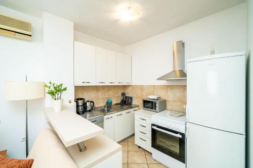 Kjøkken eller kjøkkenkrok på Down Town Apartments - Dubrovnik Centre