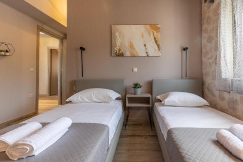 Ένα ή περισσότερα κρεβάτια σε δωμάτιο στο Di Sasso Villa