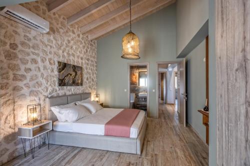 Ένα ή περισσότερα κρεβάτια σε δωμάτιο στο Di Sasso Villa