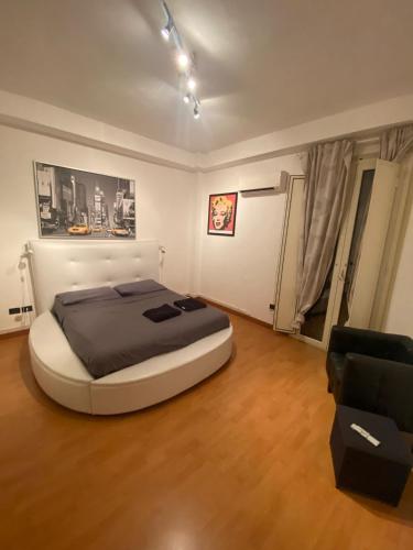Dada Apartment tesisinde bir odada yatak veya yataklar
