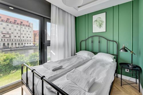 Posteľ alebo postele v izbe v ubytovaní Winter Residence Apartments 5min Old Town