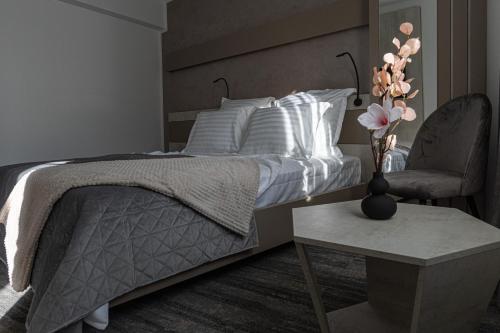 Letto o letti in una camera di Olympic Boutique