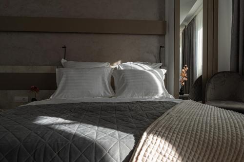 Letto o letti in una camera di Olympic Boutique