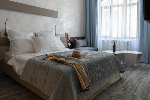 Letto o letti in una camera di Olympic Boutique