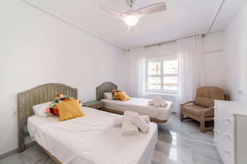 Postel nebo postele na pokoji v ubytování Apartamento Faro 2