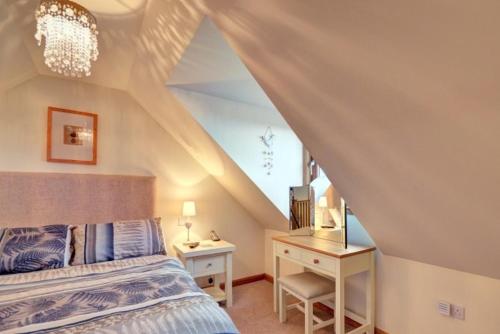 Un pat sau paturi într-o cameră la St Clements View