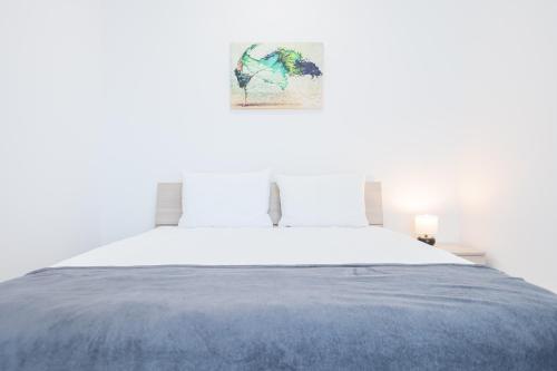 Llit o llits en una habitació de West Flat