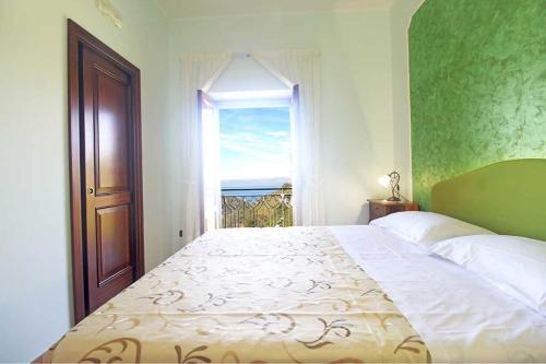 Postel nebo postele na pokoji v ubytování Casa Vacanza Puntaferano