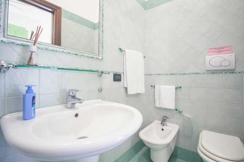 Ванная комната в Casa Vacanza Puntaferano