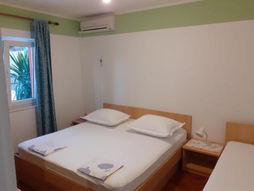 Postel nebo postele na pokoji v ubytování City Apartment Damir