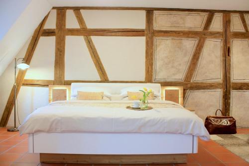 Postel nebo postele na pokoji v ubytování D & S Hotel & Ferienwohnungen