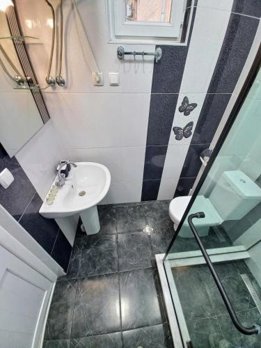 Koupelna v ubytování ApartHotel RioNi