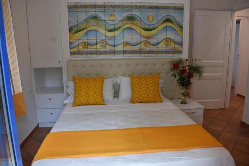 Postel nebo postele na pokoji v ubytování Donna Carmela - Da Rosa