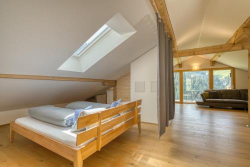 Una cama o camas en una habitación de HUS24