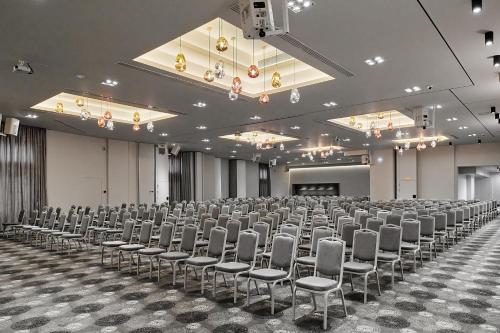 a large room with rows of chairs in it at Grand Hotel Palace in Thessaloniki