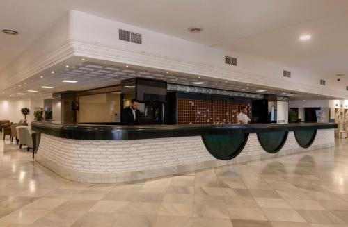 Lobbyn eller receptionsområdet på Las Palmeras Affiliated by FERGUS
