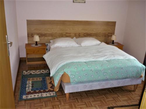 Postel nebo postele na pokoji v ubytování Gîte Hecker Alsace