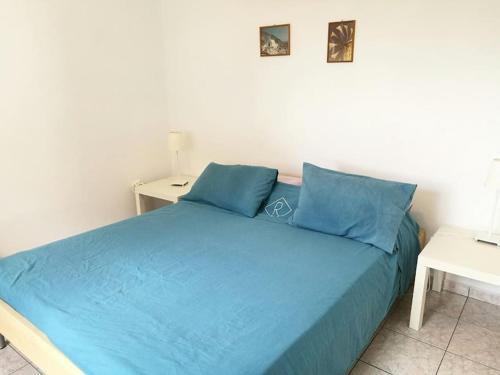 A bed or beds in a room at Villa Frangipani with large private pool, Rhodes