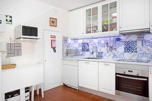 Η κουζίνα ή μικρή κουζίνα στο Casa Alfeizerão