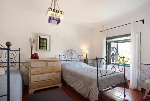 Katil atau katil-katil dalam bilik di Casa Alfeizerão