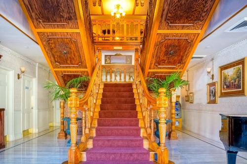 
a large staircase leading up to a large room at Horton Grand Hotel in San Diego
