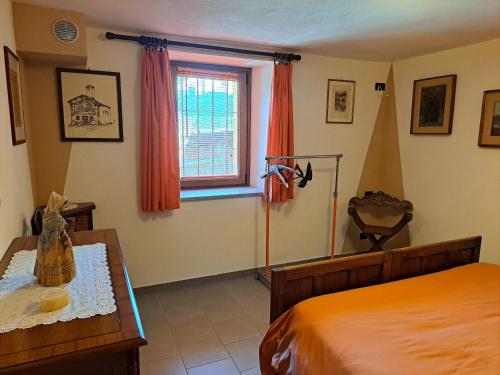 A bed or beds in a room at La maison de Chantal