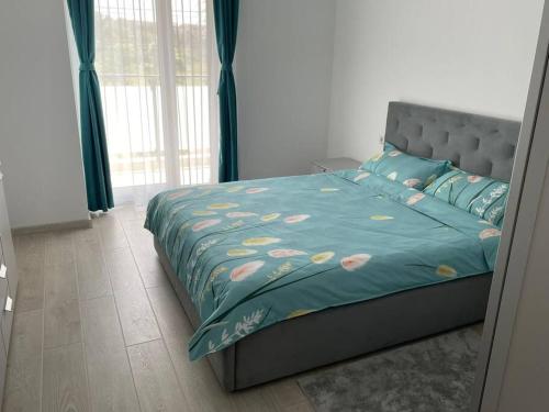 Postel nebo postele na pokoji v ubytování REBREANU RESIDENCE LUX APARTMEN