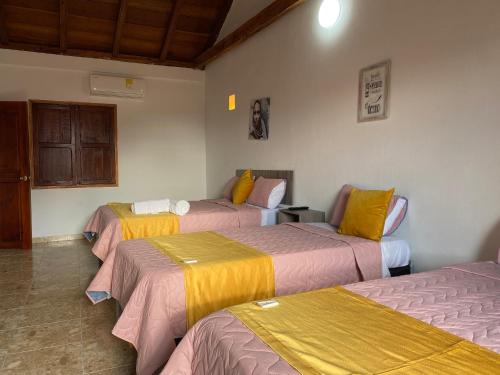 En eller flere senge i et værelse på Casa Gran Fuente