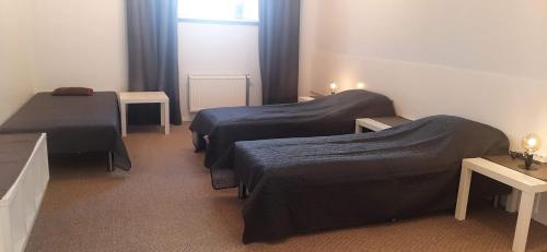Ένα ή περισσότερα κρεβάτια σε δωμάτιο στο Elite Flats Two bedroom